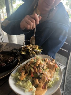 Stuffed avocado and butterless brussel sprouts  at Kid Cashew in Mount Pleasant