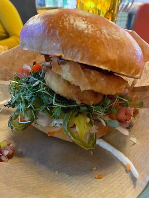 Burger with onion rings at Junk y Vegan in Helsinki