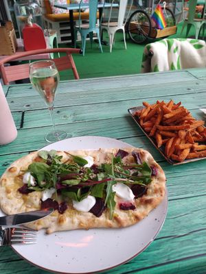 Vegan beetroot flatbread, vegan feta and sweet potato fries ✨ at Junk y Vegan in Helsinki