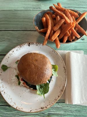 Portobello burger with sweet potato fries.  at Junk y Vegan in Helsinki