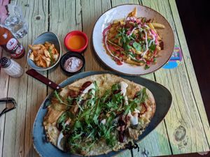 Kimchi, chickles flatbread, loaded fries at Junk y Vegan in Helsinki