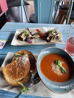 Pesto grilled cheese and fish tacos   at Junk y Vegan in Helsinki