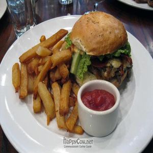 Soy Bacon Cheeseburger caramelized onions, vegan cheese, soy bacon, mushrooms, lettuce, tomato, chipotle aioli, sesame roll at V Note in New York City
