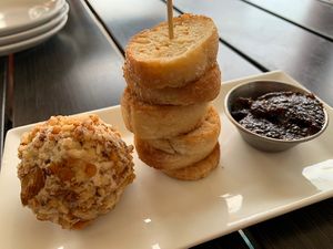 Cheese ball with crostini and fig jam  at Yummvees in Richmond
