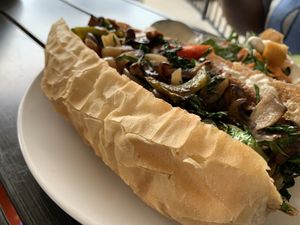 Fresh baked bread used for Italian sausage sandwich  at Yummvees in Richmond