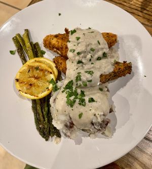 Gravy, fried chick’n, mashed potatoes, asparagus   at Yummvees in Richmond