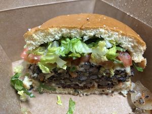 The Bacon burger.  I ate half.  The homemade fries were in the air frier warming up.  at Yummvees in Richmond