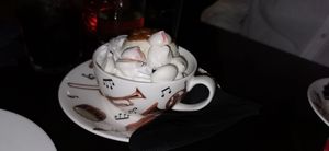 Chocolate brownie mess with cream, ice-cream, toffee sauce and meringue at The Music Cafe in Stratford-upon-avon