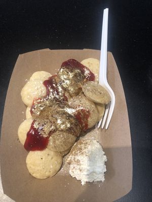 Mini pancakes with “cloudberry” topping. Note the gold dust!  at Coconut Whisk in Minneapolis