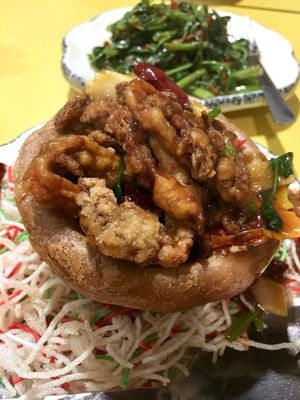 Yam basket. Creamy mashed yam, shaped into a basket and deep fried for crispy exterior, filled with crispy mushrooms, cashews and veggies. Vegan.  at Tian Pin Vegetarian Restaurant in Petaling Jaya