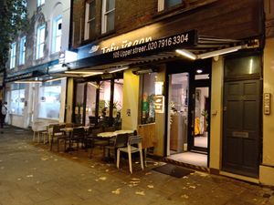 Entrance and outside seating at Tofu Vegan - Islington in North London