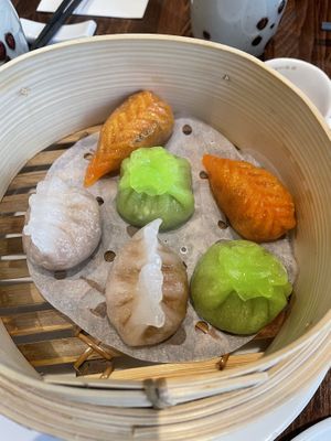 Assorted dim sum. White one contains chilli, others are mushroom  at Tofu Vegan - Islington in North London