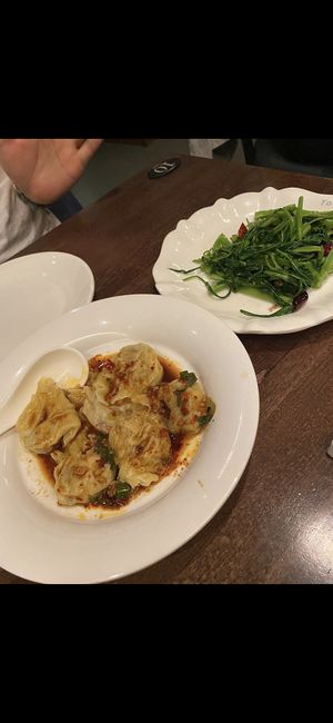 Spicy wantons and morning glory style greens  at Tofu Vegan - Islington in North London