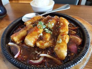 'Sizzling tofu in house special sauce' with rice & spicy (£13.80) at Tofu Vegan - Islington in North London