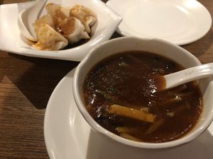 Spicy and sour soup and dumplings  at Tofu Vegan - Islington in North London