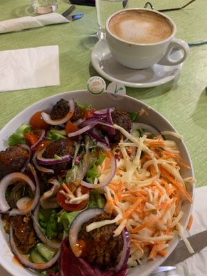 Oat milk flat white and falafel salad... delicious  at Market Place Cafe in Wells