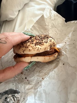 Sausage & chz on an everything bagel   at Curiosity Coffee Bar in Columbia