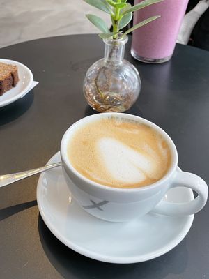 Cappuccino with almond milk  at Oliver Green - West in Amsterdam