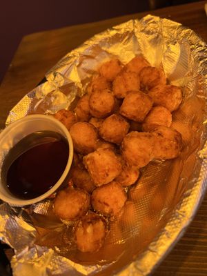 Sweet potato tots served with...maple syrup??  at Wizard Burger in Albany
