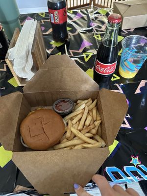 Combo with the regular burger, fries, and a coke  at Wizard Burger in Albany