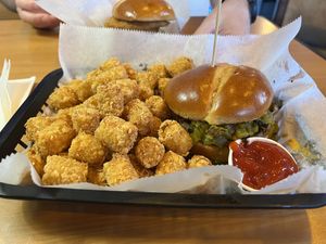 Green goblin with a single order of tots  at Wizard Burger in Albany