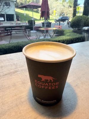Oat milk latte w/orange spice   at Equator Coffees in Larkspur