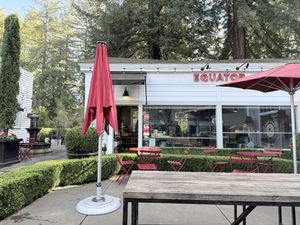 Exterior with outdoor seating, amongst the trees   at Equator Coffees in Larkspur