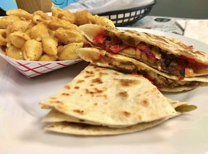 Chicken fajita quesadilla (on special) with mac and cheese  at Take Two Cafe in Schenectady
