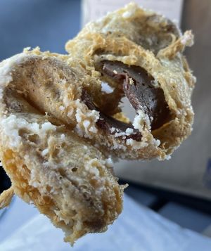 Batter dipped bacon with chocolate sauce!  at Herbie Butcher's Fried Chicken in Minneapolis