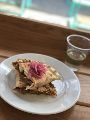 Roasted veg and vegan feta flatbread   at Urban Green Cafe in Newcastle Upon Tyne
