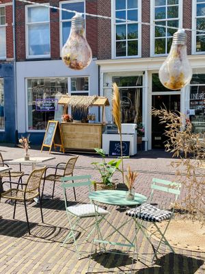 Look and feel of the terrace. In the background you see our juice-bar. Guests can choose their own fruits to juice. at Blossom in Leiden