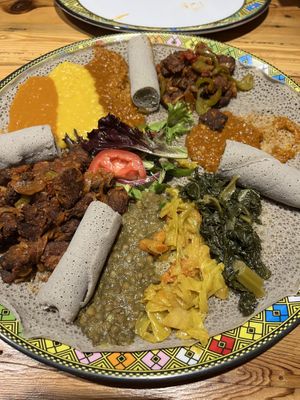 Vegetarian platter, with Tempeh tibs order on same platter. Tibs, spicy red lentil, and chickpea dishes were favorites.  at Addissae in Asheville