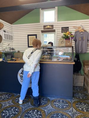 Perusing the offerings  at New Moon Vegan in Batavia