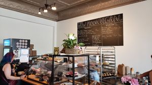 Interior, June 3, 2023. One day after grand opening. They have a variety of baked goods, drinks and a pre-made breakfast sandwich. at New Moon Vegan in Batavia