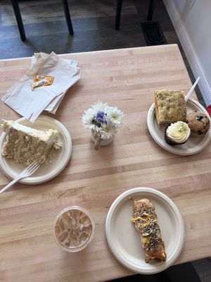 Jalapeño pretzel dog, focaccia, lemon cupcake, blueberry muffin, 3 layer coconut cake, chai tea  at New Moon Vegan in Batavia