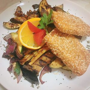 Sesame crusted tofu with grilled vegetables at Ragazzi bistro in Esztergom