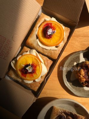 .flaming sun

puff pastry crust
orange olive oil sponge cake
red wine syrup
raspberry compote
orange blossom cream
candied orange at Not Your Mama in Ho Chi Minh City