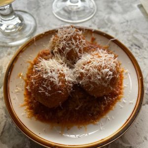 Arancini - risotto balls in tomato sauce  at Soda Club in New York City
