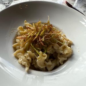 Giggling pasta in a truffle cream sauce and topped with crispy leeks  at Soda Club in New York City