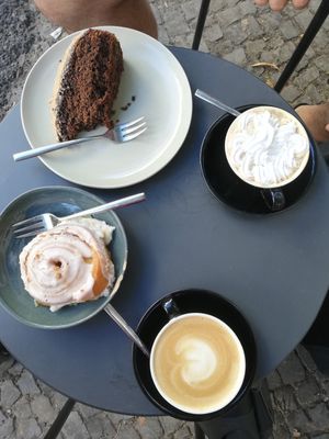 Biscoff bun, coffee cake and cappuccini (one with whipped cream) at Calm Coffee in Berlin