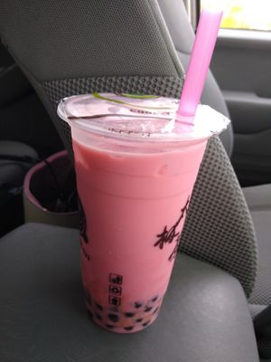 The top of the watermelon "milk" boba tea. It is a clear plastic that I stuck the straw through. at Taichi Bubble Tea in Chattanooga