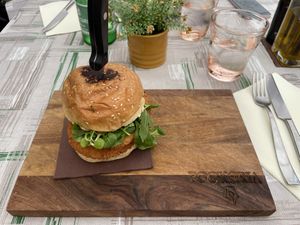 Kale&quinoa burger with different patty. Quite expensive for over 10€ cost  at Bookeria in Rovinj