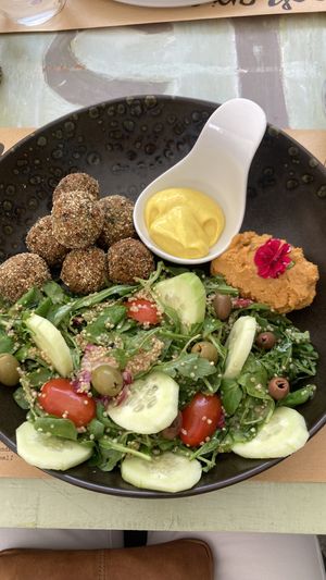Falafel with quinoa salad, hummus and vegan mayonaise  at Bookeria in Rovinj