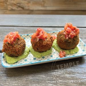 Black bean filled croquettes stuffed with jackfruit, seasoned veggies,
garlic, onion, and capsicum. Served with coriander vegan mayonnaise +
vinaigrette at Temple Brewpub  in Brunswick East
