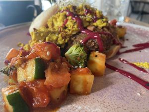 Crumbed Portobello Muffin with tofu scramble   at Crave Cairns in Cairns
