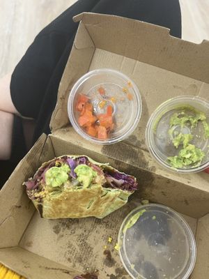 Scrambled tofu burrito with added hashbrown  at Crave Cairns in Cairns