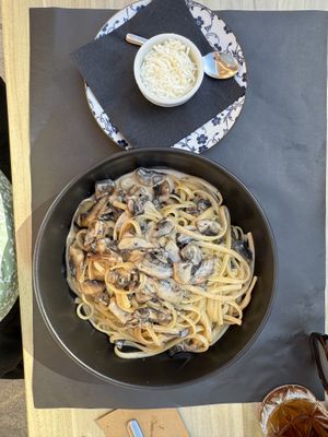 Linguine with Vegan Cream and Mushroom with vegan cheesee  at Artisti in Corfu
