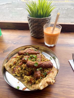 Vegan sausage and tofu naan, mango lassi  at Sabzi in Edinburgh