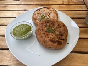 Appetizer, bread filled with lentils and chutney  at Sattva Vegan in Vienna