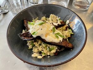 Aubergine grillée et boulgour au citron confit  at Légumes des Jours in Paris